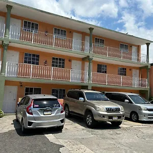 https://tropical-manor-inn-kingston.hotelsochorios.net